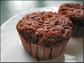 Schokoladenmuffins mit fl&uuml;ssigem Schokoladenkern